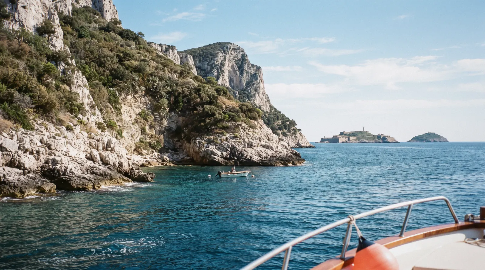 Palmaria island seen from Portovenere across the narrow strait, with the Cinque Terre coast of Liguria, Italy beyond