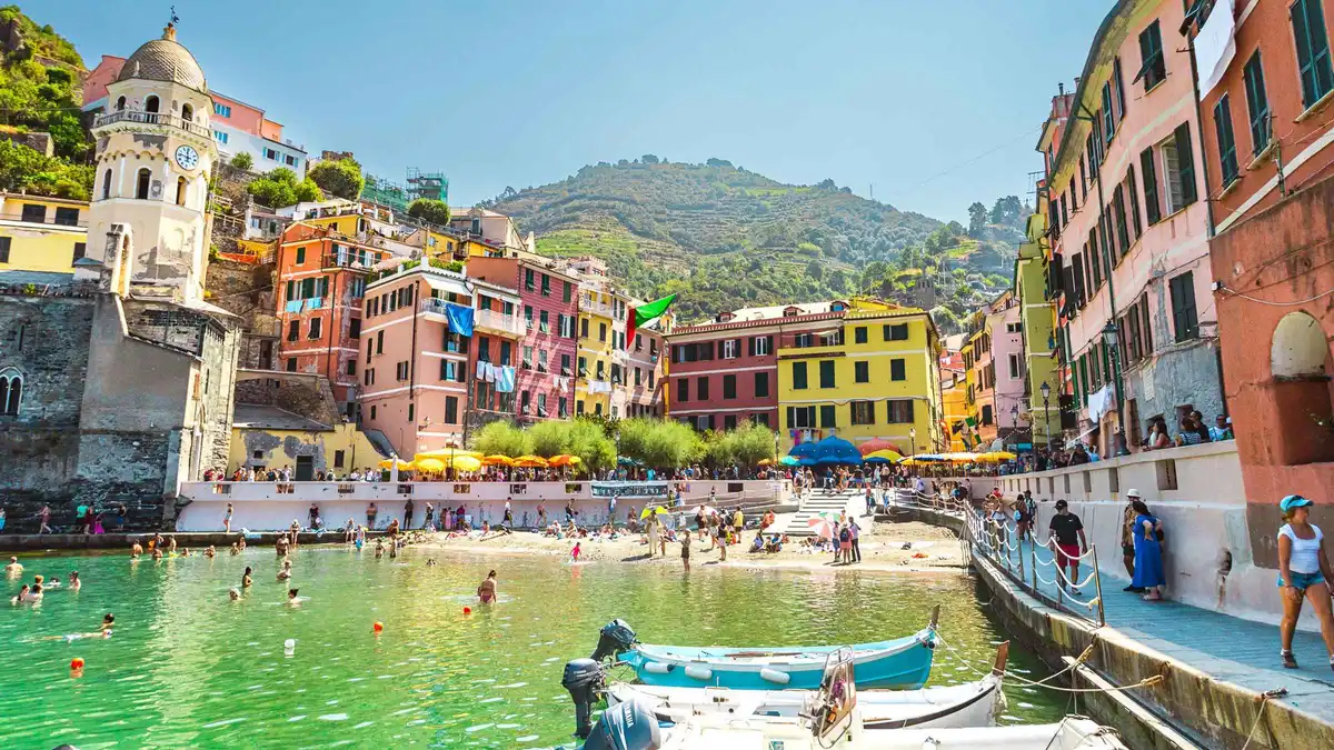 Travelers sampling Ligurian street food on a Cinque Terre day trip from Florence