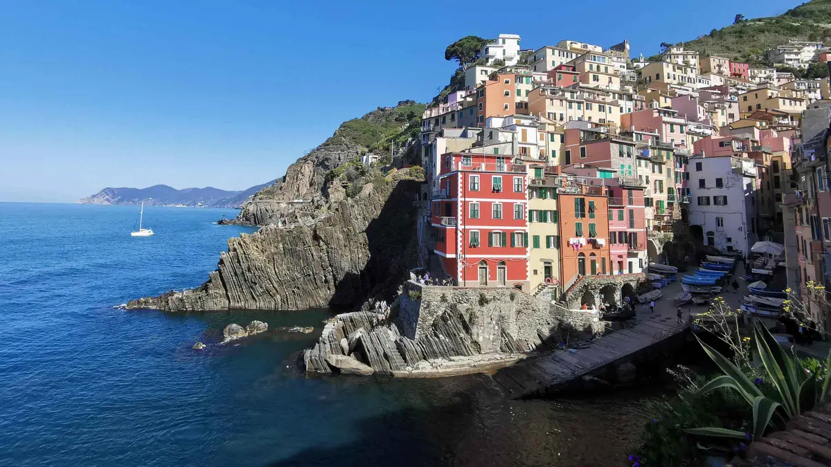 Small tour group visiting the Leaning Tower of Pisa on a Cinque Terre day trip from Florence
