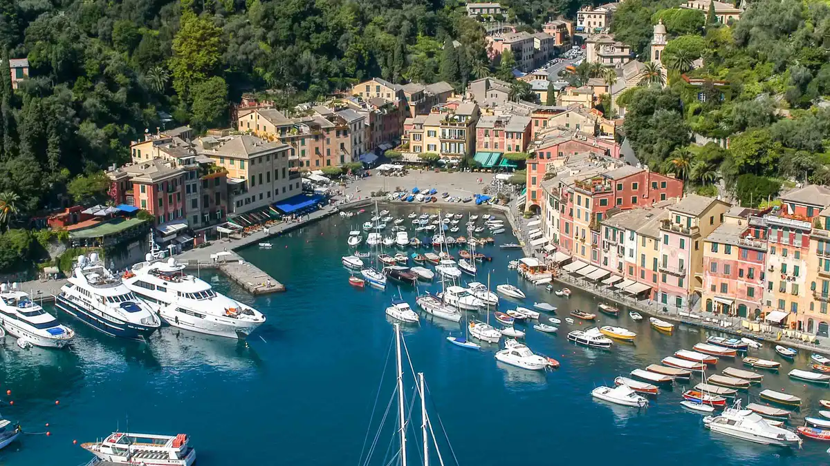 Passenger ferry approaching the San Fruttuoso Abbey cove near Camogli on the Ligurian coast