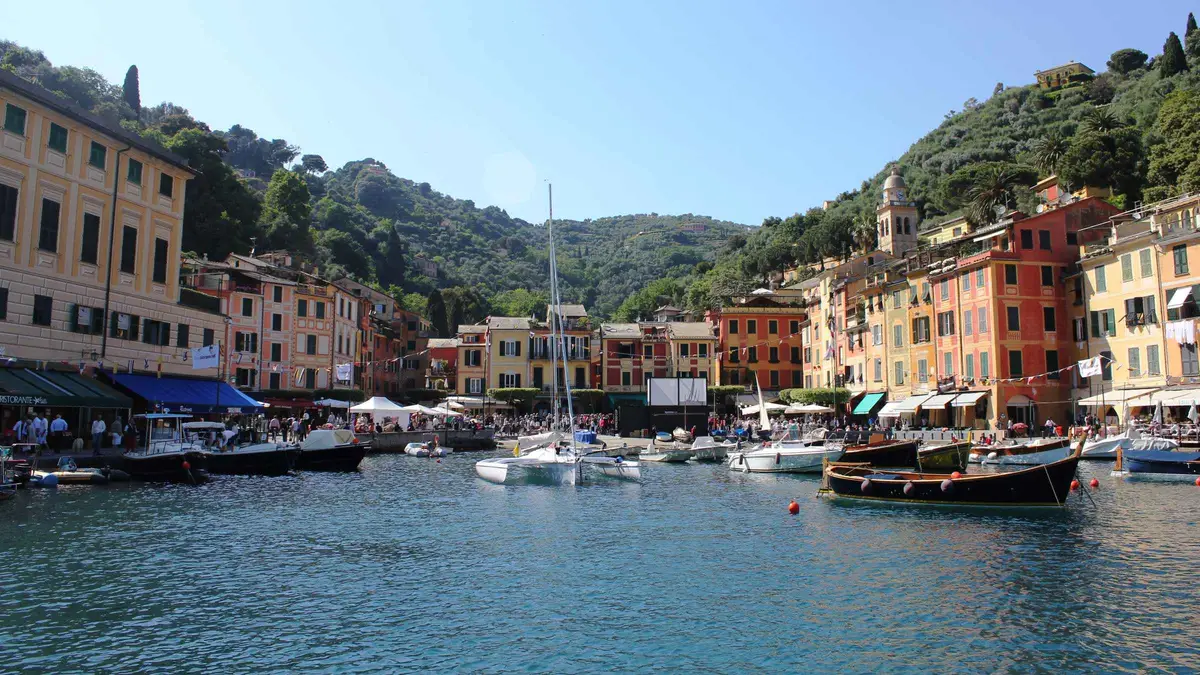 Passenger ferry arriving in the harbor of Portofino from Genoa