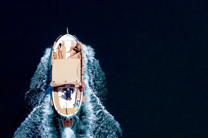 Traditional Ligurian gozzo boat on a private Cinque Terre charter tour from Monterosso