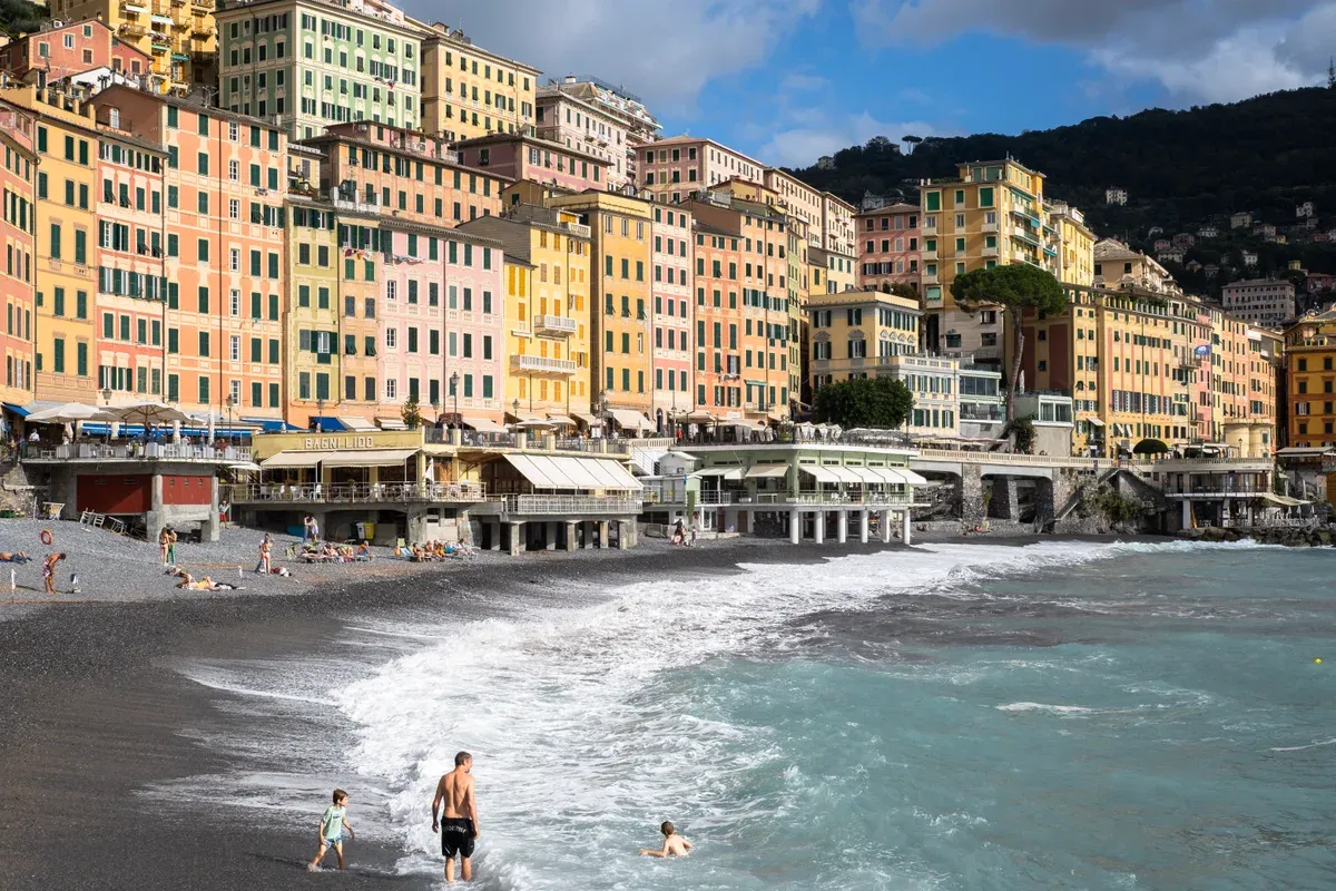 The beach and colourful waterfront houses of Camogli, Italy, on the Golfo Paradiso near the Cinque Terre