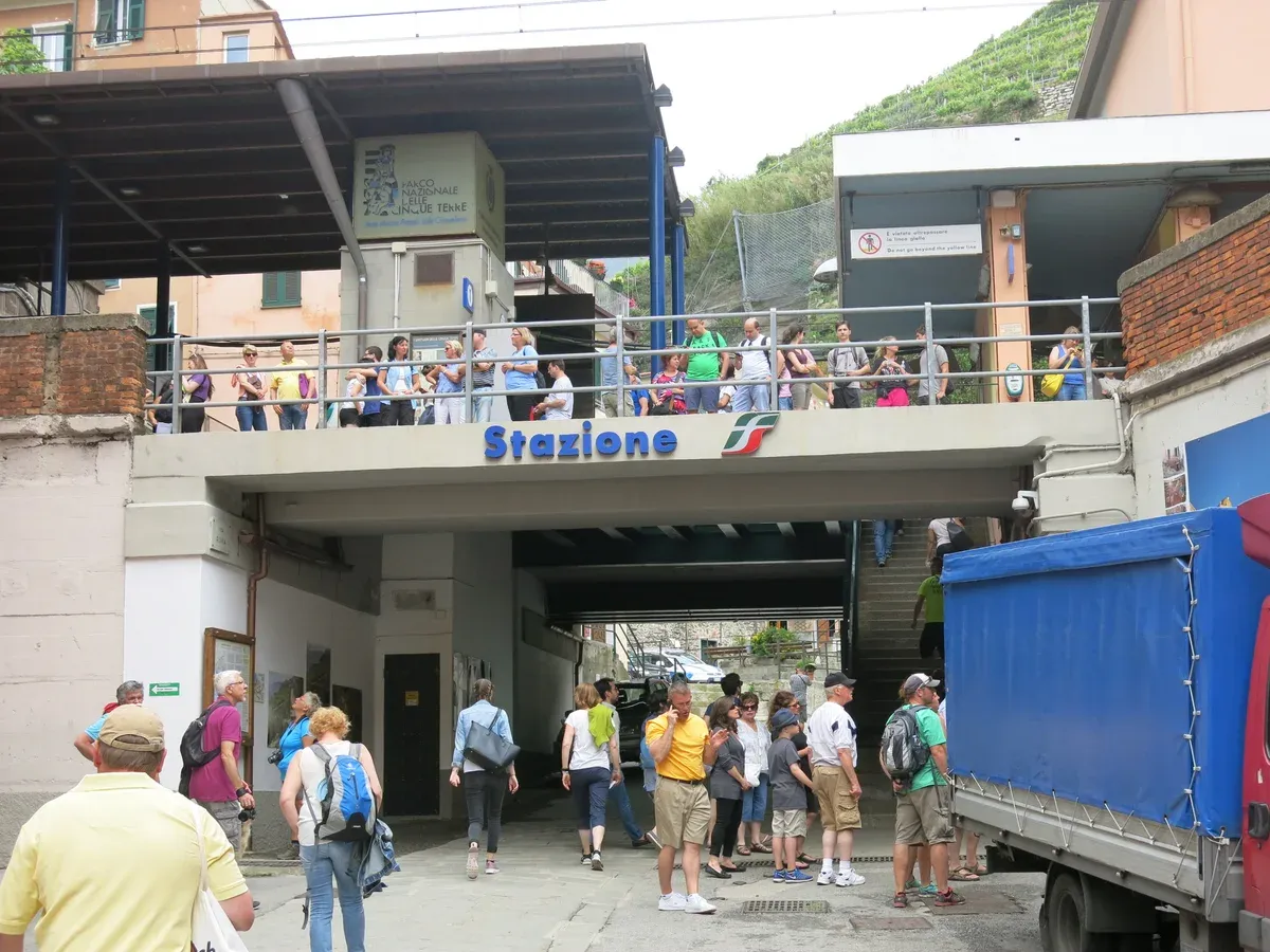 Crowded platform underpass at Vernazza train station, a scene typical of a busy Cinque Terre in one day train itinerary