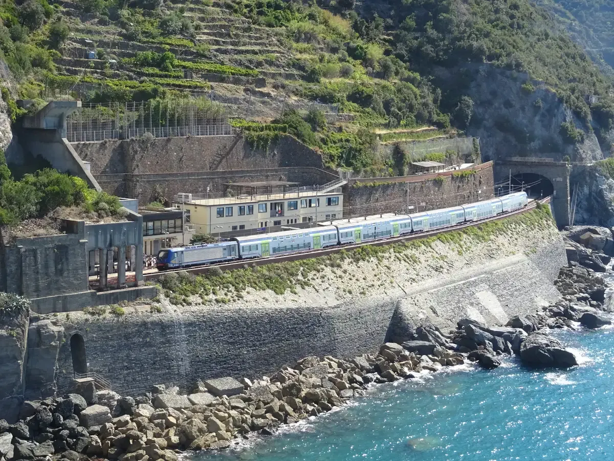 A regional train arriving at Manarola station on the Cinque Terre line, Italy