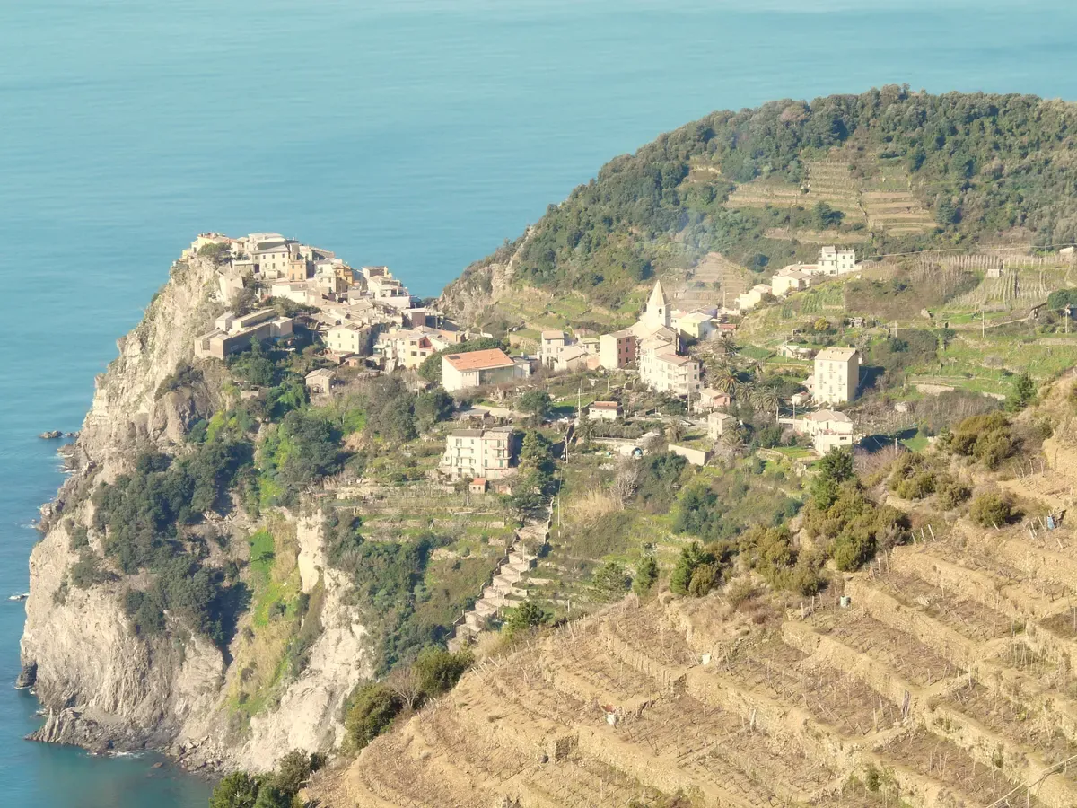 Corniglia on its clifftop with the Lardarina stairway climbing from the station, Cinque Terre, Italy
