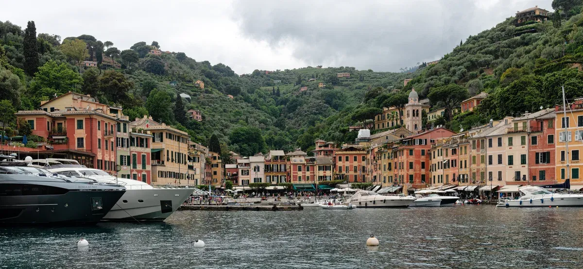 Portofino harbour in Liguria, Italy, seen from the water on the day trip route from the Cinque Terre