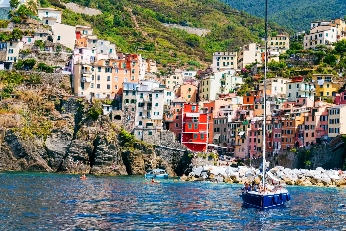 Riomaggiore, Cinque Terre, Via Colombo climbing from the harbour between tall tower houses